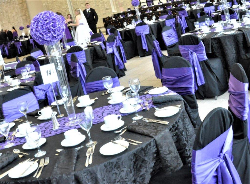 Luxe Black Chair Covers with Purple Satin Sashes Waterloo Regional Museum Wedding Event
