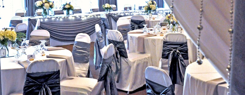 Dark Silver Satin Chair Cover Sashes over White Chair Covers at Dundee Country Club, New Dundee Ontario