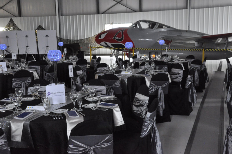 Airport Hangar Weddings and Events - Black Chair Covers, Dark Silver Satin Sashes, Kitchener Waterloo