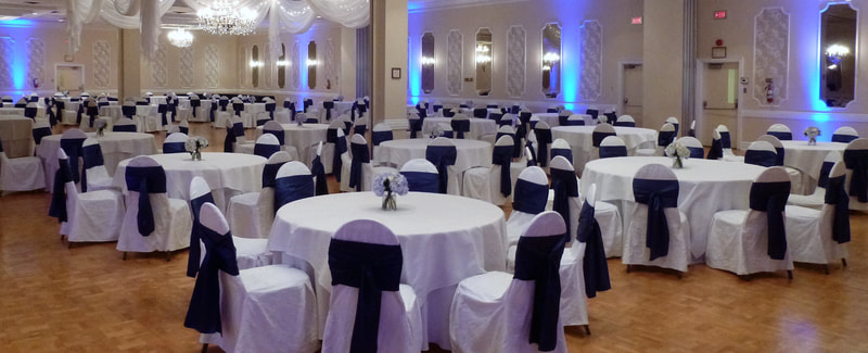 Inn of Waterloo Wedding and Events - White Chair Covers with Navy Satin Sashes