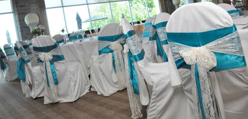 Deer RIdge Golf Club Weddings - White Chair Covers with Teal Satin Sashes and White Lace Sash Overlays