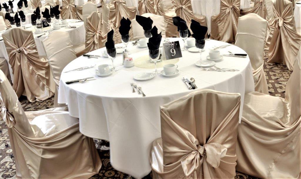Golf's Steakhouse Weddings and Events - Champagne Gold Satin Chair Covers