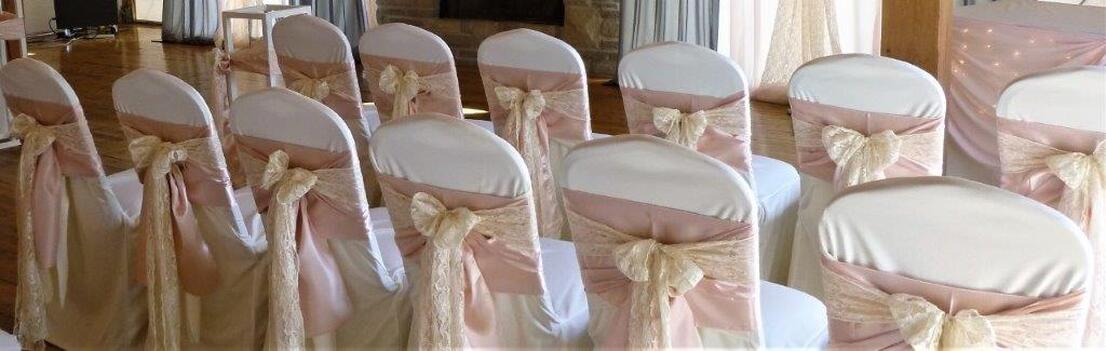 Kitchener Waterloo White Chair Covers with Pink Champagne Satin Sahes and Lace Overlays